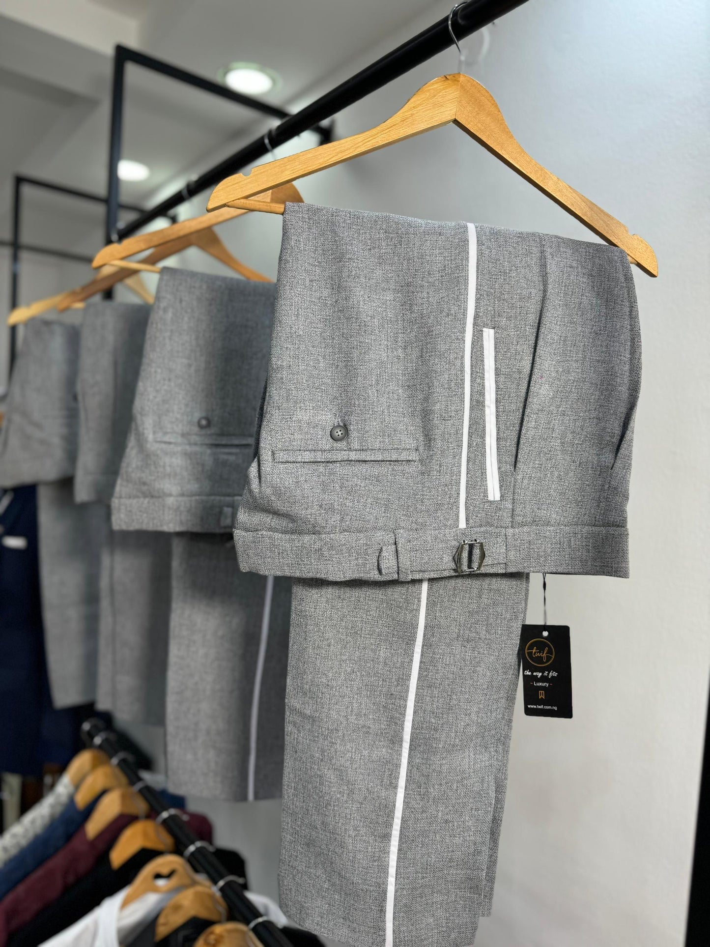 Grey loose fit textured pants with side stripe